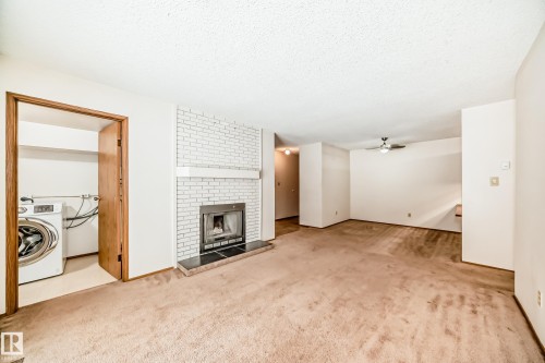 104 70 Alpine Place, St. Albert, AB - Indoor With Fireplace