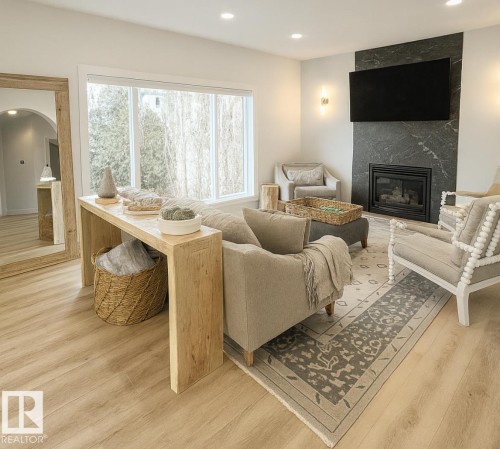 820 Ormsby Close, Edmonton, AB - Indoor Photo Showing Living Room With Fireplace