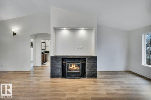 5220 47A Avenue, Rural Lac Ste. Anne County, AB - Indoor Photo Showing Living Room With Fireplace