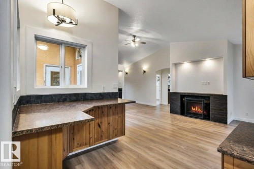 5220 47A Avenue, Rural Lac Ste. Anne County, AB - Indoor Photo Showing Other Room With Fireplace