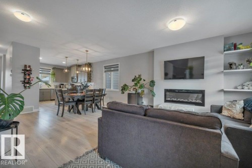 306 Balsam Link, Leduc, AB - Indoor Photo Showing Living Room With Fireplace