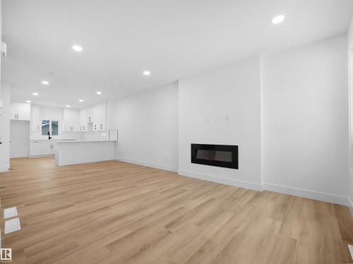 788 Cy Becker Drive, Edmonton, AB - Indoor Photo Showing Living Room With Fireplace
