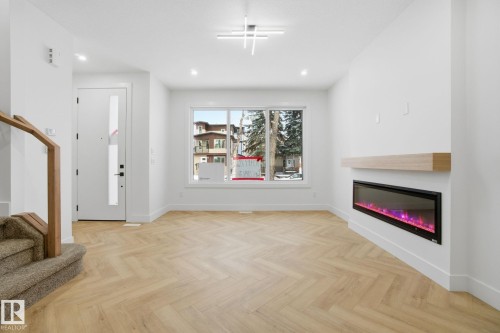 10919 79 Avenue, Edmonton, AB - Indoor Photo Showing Living Room With Fireplace