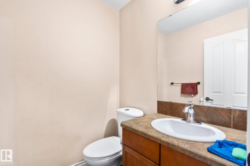 Bathroom with vanity and toilet - 1888 33 Street, Edmonton, AB - Indoor Photo Showing Bathroom