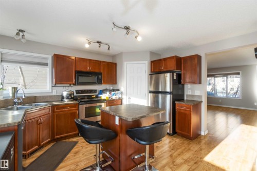 5807 Sutter Pl, Edmonton, AB - Indoor Photo Showing Kitchen With Double Sink
