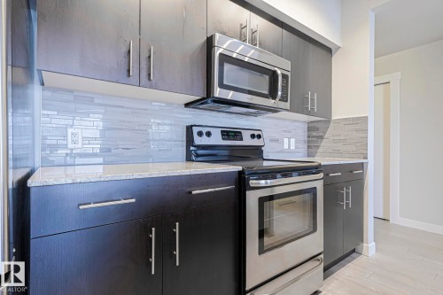 703 10226 104 Street, Edmonton, AB - Indoor Photo Showing Kitchen With Upgraded Kitchen