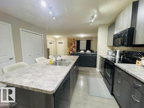 3116 17 Avenue, Edmonton, AB - Indoor Photo Showing Kitchen With Double Sink With Upgraded Kitchen