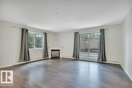 102 2903 Rabbit Hill Road, Edmonton, AB - Indoor Photo Showing Living Room