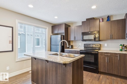 46 5317 3 Avenue, Edmonton, AB - Indoor Photo Showing Kitchen With Double Sink