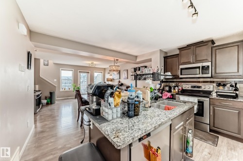 29 1816 Rutherford Road Sw, Edmonton, AB - Indoor Photo Showing Kitchen With Stainless Steel Kitchen With Double Sink With Upgraded Kitchen