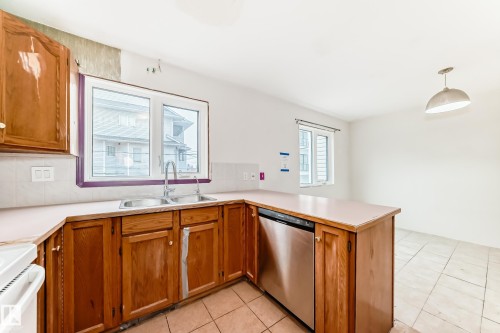 11642 103 Avenue, Edmonton, AB - Indoor Photo Showing Kitchen With Double Sink