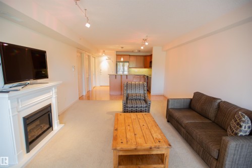 325 7510 89 Street, Edmonton, AB - Indoor Photo Showing Living Room With Fireplace