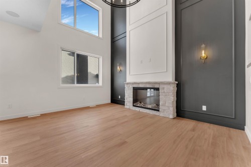 31 Eldridge Point(E), St. Albert, AB - Indoor Photo Showing Living Room With Fireplace