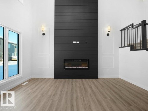 3310 Chickadee Dr, Edmonton, AB - Indoor Photo Showing Living Room With Fireplace