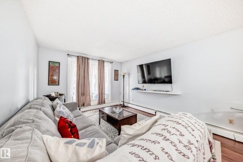 103 2624 Mill Woods Road E, Edmonton, AB - Indoor Photo Showing Living Room