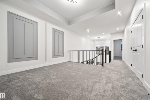 Carpeted spare room featuring recessed lighting and baseboards - 3164 Magpie Way, Edmonton, AB - Indoor Photo Showing Other Room