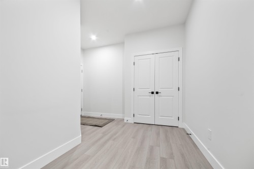 Corridor featuring light wood-style floors and recessed lighting - 3164 Magpie Way, Edmonton, AB - Indoor Photo Showing Other Room