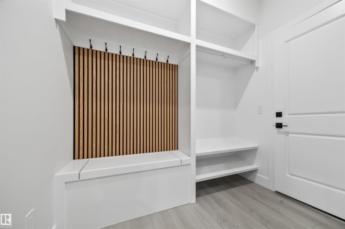 Mudroom featuring light wood finished floors - 3164 Magpie Way, Edmonton, AB - Indoor