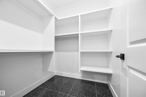 View of walk in closet - 3164 Magpie Way, Edmonton, AB - Indoor With Storage