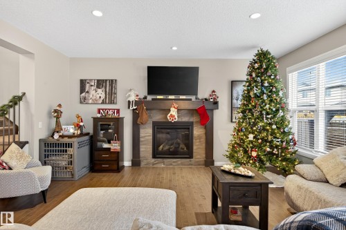 17838 60A Street, Edmonton, AB - Indoor Photo Showing Living Room With Fireplace