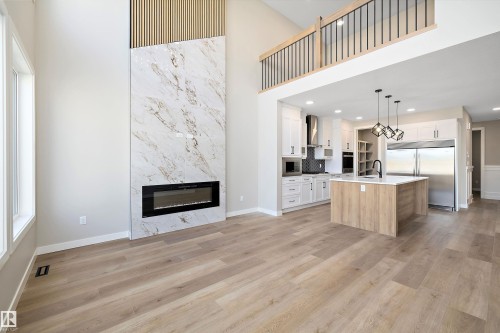 79 Chelles Wynd, St. Albert, AB - Indoor Photo Showing Living Room With Fireplace