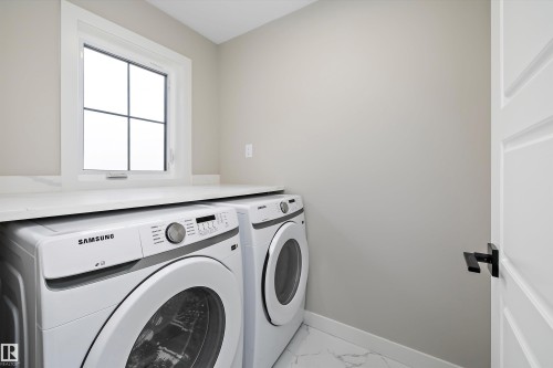 79 Chelles Wynd, St. Albert, AB - Indoor Photo Showing Laundry Room