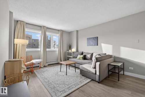 308 9710 105 Street, Edmonton, AB - Indoor Photo Showing Living Room