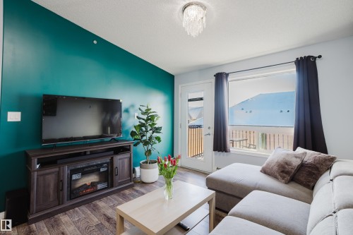 7412 7327 South Terwillegar Drive, Edmonton, AB - Indoor Photo Showing Living Room With Fireplace