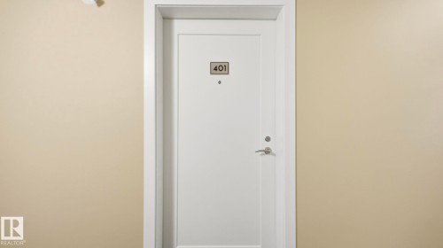 401 17 Columbia Avenue W, Devon, AB - Indoor Photo Showing Other Room