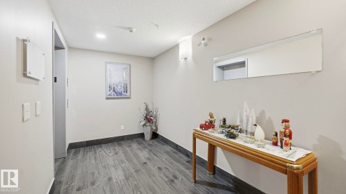 401 17 Columbia Avenue W, Devon, AB - Indoor Photo Showing Other Room