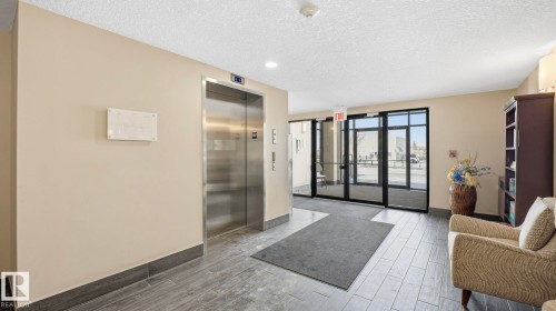 401 17 Columbia Avenue W, Devon, AB - Indoor Photo Showing Other Room