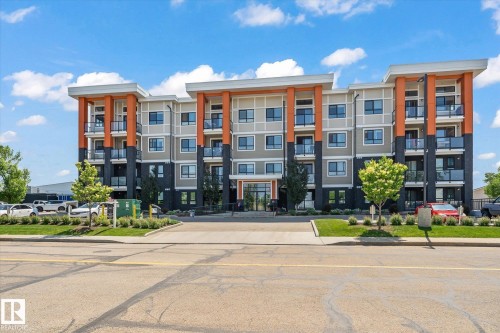 401 17 Columbia Avenue W, Devon, AB - Outdoor With Balcony With Facade