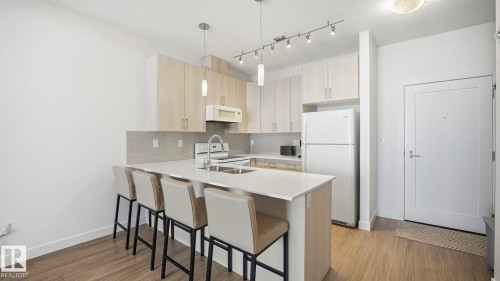 401 17 Columbia Avenue W, Devon, AB - Indoor Photo Showing Kitchen With Double Sink