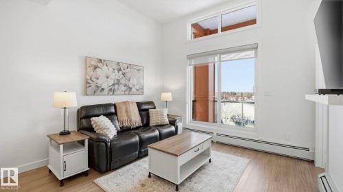 401 17 Columbia Avenue W, Devon, AB - Indoor Photo Showing Living Room