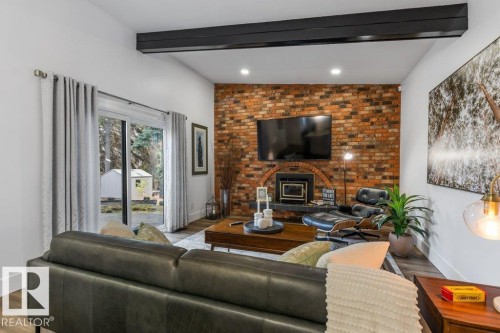 5 Gilchrist Place, St. Albert, AB - Indoor Photo Showing Living Room With Fireplace
