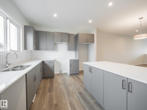 9 Nerine Crescent, St. Albert, AB - Indoor Photo Showing Kitchen With Double Sink