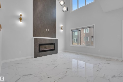 3516 41 Avenue, Beaumont, AB - Indoor With Fireplace