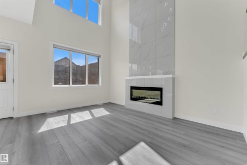 21 Westwyck Link, Spruce Grove, AB - Indoor Photo Showing Living Room With Fireplace