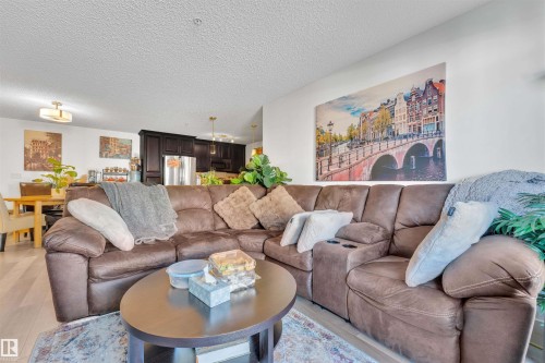 228 6076 Schonsee Way, Edmonton, AB - Indoor Photo Showing Living Room
