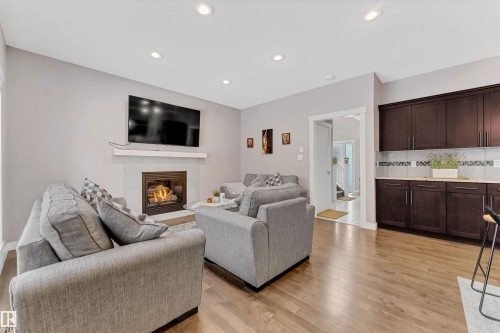 723 57 Street, Edmonton, AB - Indoor Photo Showing Living Room With Fireplace