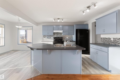 75 Dunlop Wynd, Leduc, AB - Indoor Photo Showing Kitchen With Double Sink
