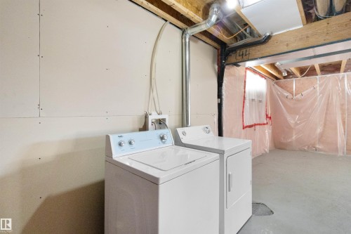 75 Dunlop Wynd, Leduc, AB - Indoor Photo Showing Laundry Room