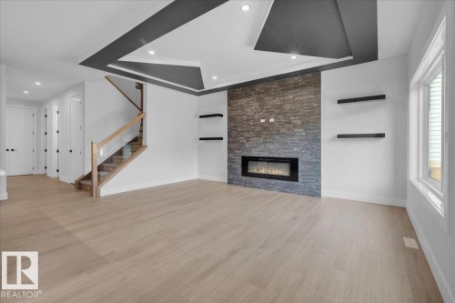 63 Waverly Way, Fort Saskatchewan, AB - Indoor Photo Showing Living Room With Fireplace