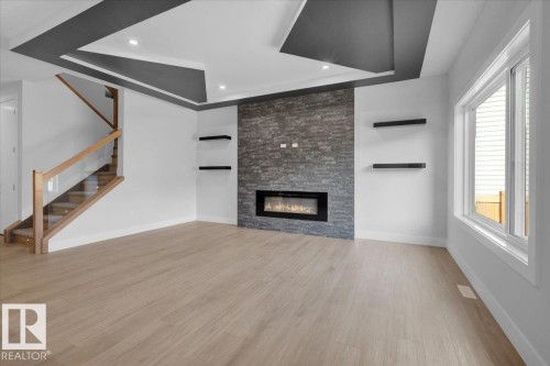 63 Waverly Way, Fort Saskatchewan, AB - Indoor Photo Showing Living Room With Fireplace