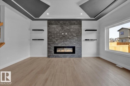 63 Waverly Way, Fort Saskatchewan, AB - Indoor Photo Showing Living Room With Fireplace