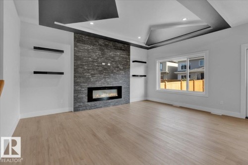 63 Waverly Way, Fort Saskatchewan, AB - Indoor Photo Showing Living Room With Fireplace
