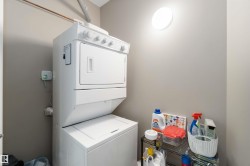 Washroom featuring estacked washer and dryer - 