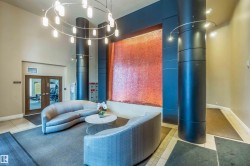 Common area featuring a towering ceiling - 