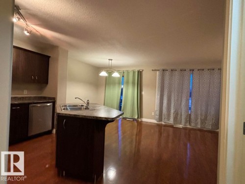 68 Meridian Loop, Stony Plain, AB - Indoor Photo Showing Kitchen With Double Sink