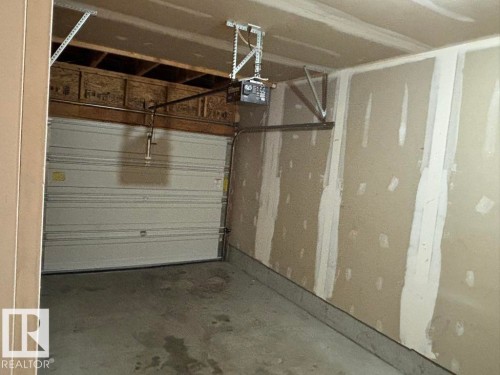 68 Meridian Loop, Stony Plain, AB - Indoor Photo Showing Garage
